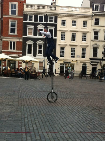 One of the students from school of English EC London assisted the street performer One of the students from school of English EC London assisted the street performer