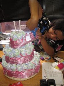 may-21-2010-001 Lykai assembles the diaper cake.