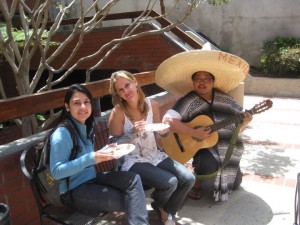 may51 Paolo serenades students.