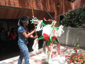 may541 A student wacks at the pinata!