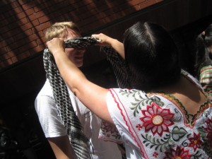 may56 Martha, EC San Diego Center Director, blindfolds a student.