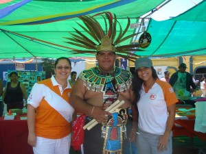 dsc08175 Martha and Mardy pose with an Aztec dancer.