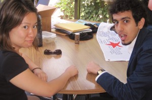 ECSD student Ibrahim and staff member Tina knock on wood for good luck - they want to avoid getting a parking ticket unlike their friend Elisabeth!