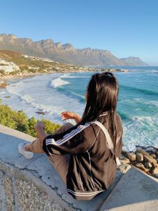 EC Cape Town student overlooking the ocean.